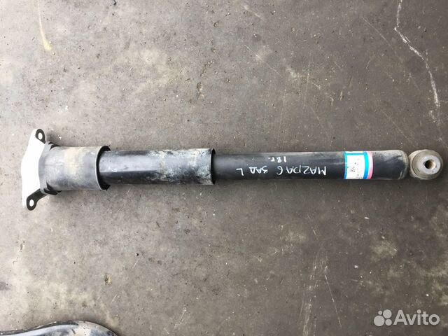Мазда 6 Амортизатор задний левый