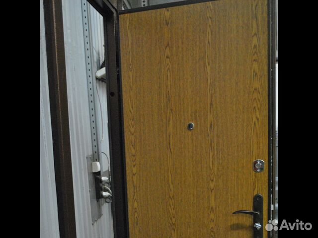 В Лобне дверь из 2 мм металла с отделкой дуб седан