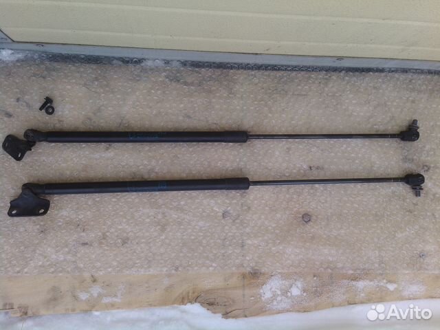 Опель Корса D- упоры крышки багажника