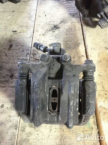 Суппорт тормозной задний левый Honda Accord 8 2.4