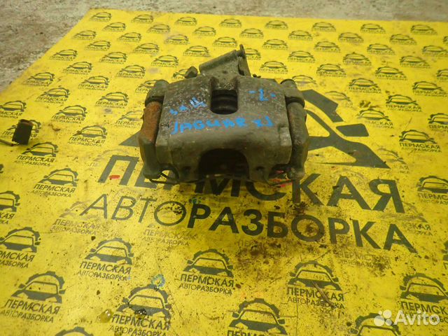 Суппорт тормозной задний левый для Jaguar XJ 2009)