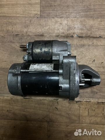 Стартер BMW 7515392