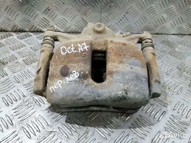 Суппорт тормозной передний Шкода Октавия А7