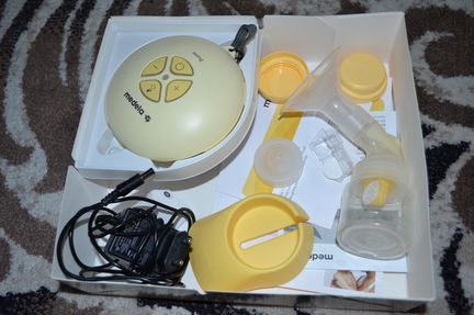 Тихий молокоотсос Medela